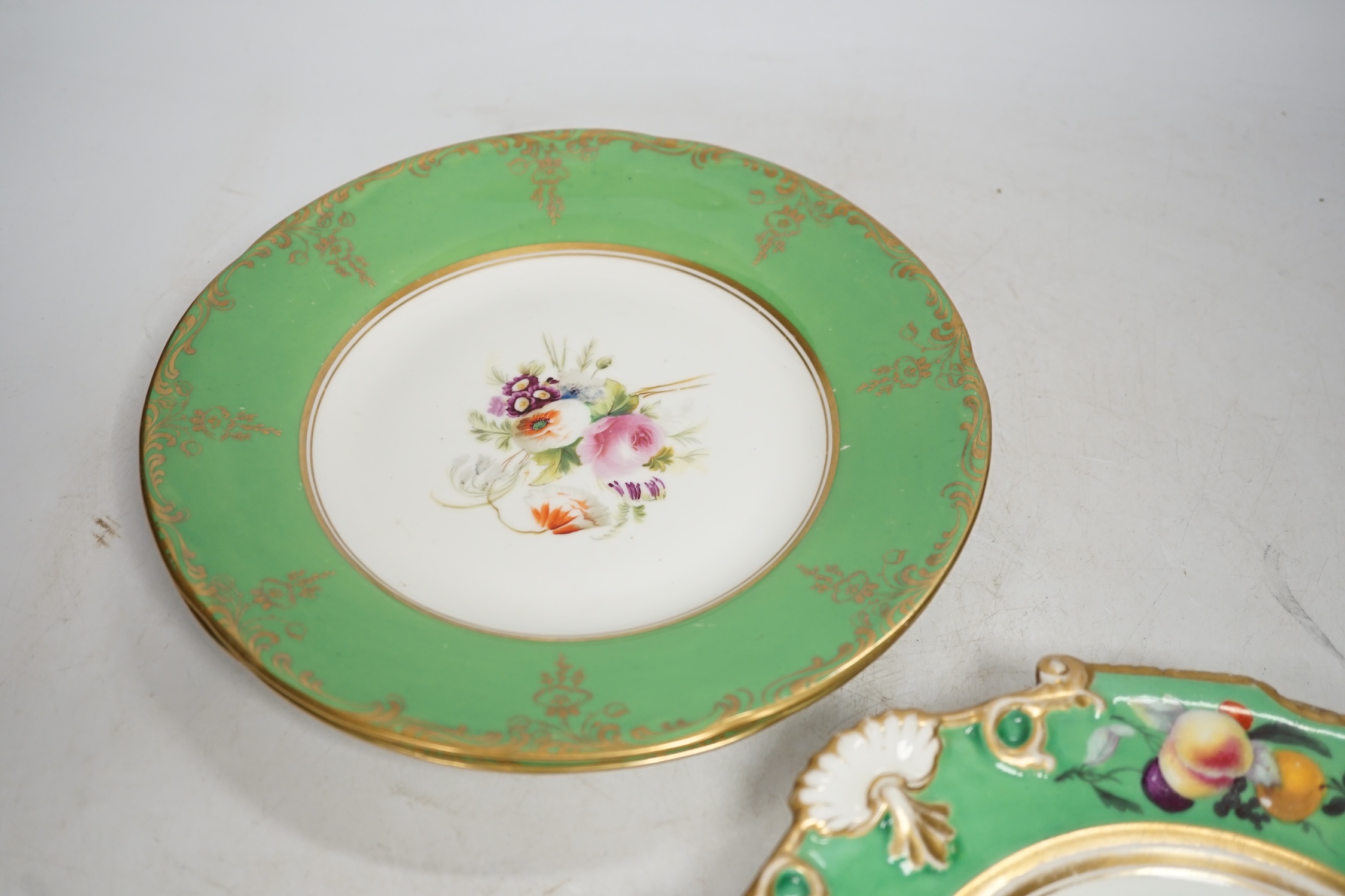 A group of English porcelain green ground dessert plates and dishes, largest 24cm diameter. Condition - fair